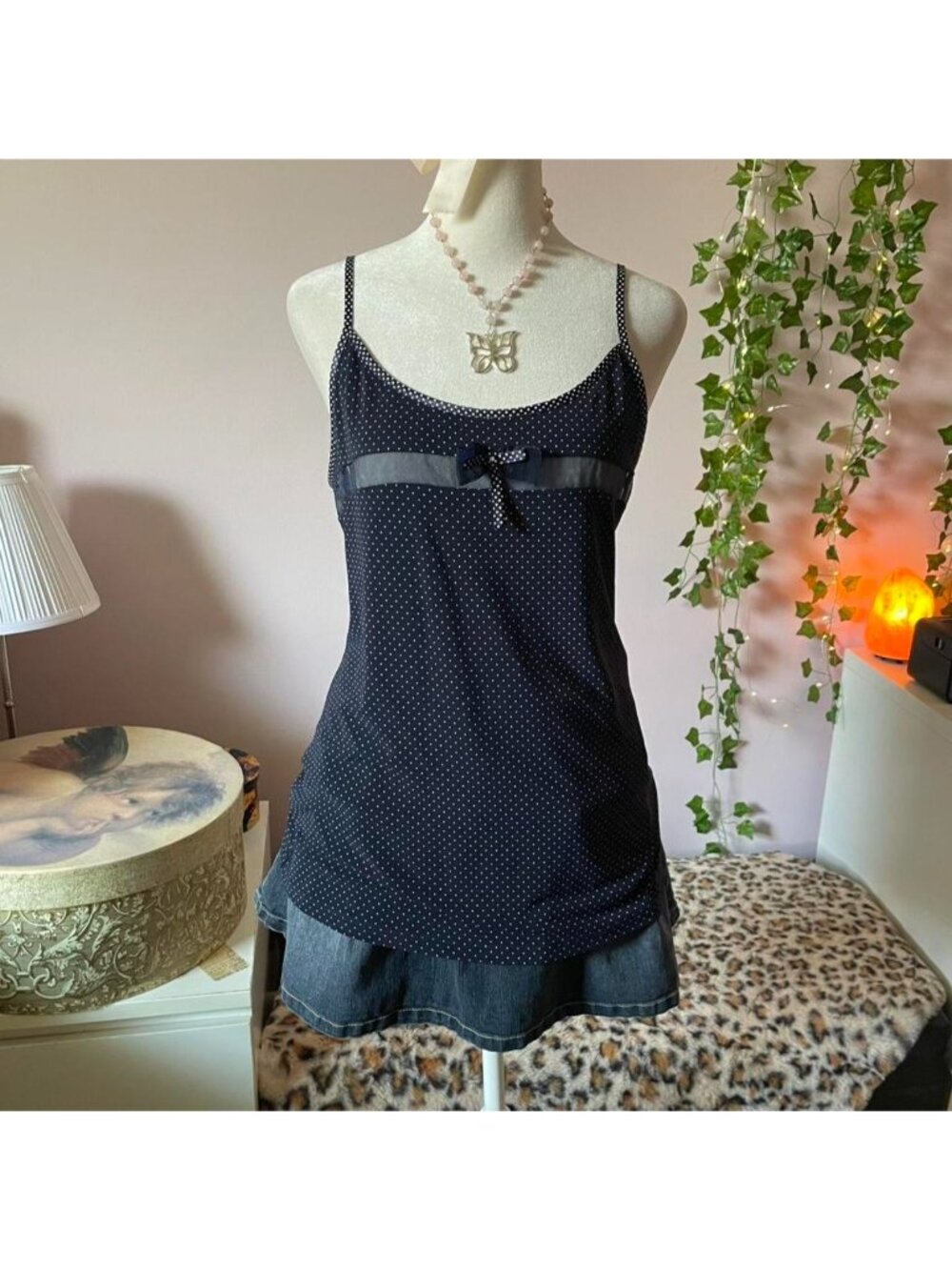Navy blue polka dot tank top with bow detail
